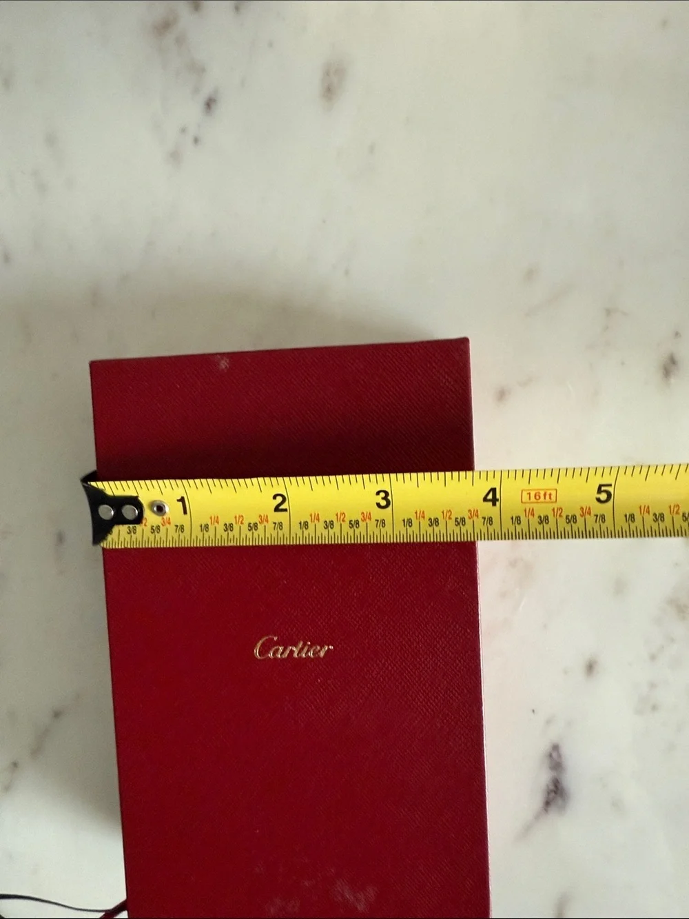 Cartier Red and Black Hardcover Notebooks with Gold Accents
